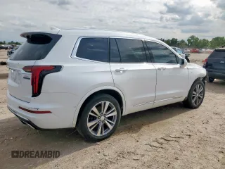 2020 Cadillac XT6 FWD Premium Luxury z VIN 1GYKPCRS9LZ107178, wystawiony jako Copart lot #58789335 z przebiegiem 154 428 mil mil oraz Nie do naprawy. Historia ofert i sprzedaży dostępna na DreamBid. Obrazek 3.