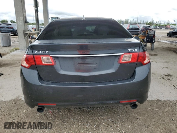 2012 Acura TSX с VIN JH4CU2F47CC007987, выставлен на аукционе Copart как лот 59218385 с пробегом Не указан миль и Списание • Salvage title. История ставок и продаж доступна на DreamBid. Изображение 6.