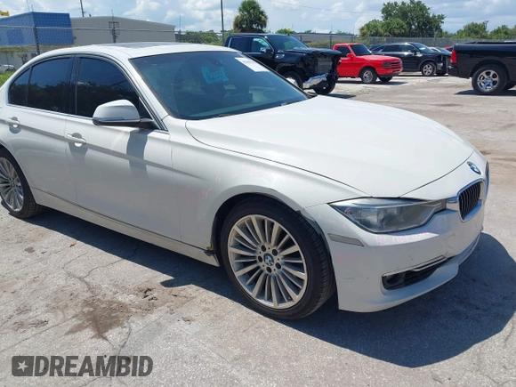 2014 BMW 3 Series 328i with VIN WBA3A5C54EP600398, listed as a IAAI auction lot 42665302 with 117,012 mi miles and . Bid and sale history available at DreamBid. Image 6.