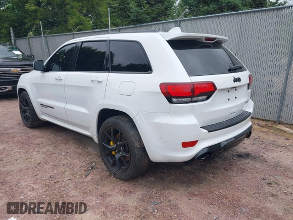 2021 Jeep Grand Cherokee Trackhawk with VIN 1C4RJFN95MC843131, listed as a IAAI auction lot 42688185 with 16,391 mi miles and . Bid and sale history available at DreamBid. Image 3.
