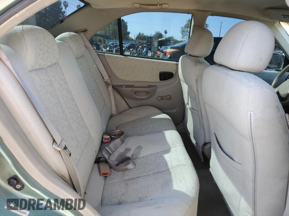 2004 Hyundai Accent GL with VIN KMHCG45C44U533952, listed as a Copart auction lot 51181095 with 88,446 mi miles and Salvage Title. Bid and sale history available at carsss.com. Image 10.