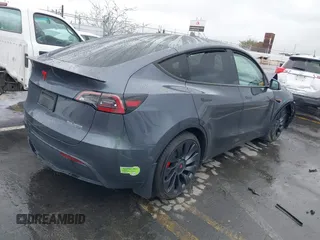 2023 Tesla Model Y Performance with VIN 7SAYGDEF0PF774282, listed as a IAAI auction lot 41807031 with Not Provided miles and . Bid and sale history available at DreamBid. Image 4.