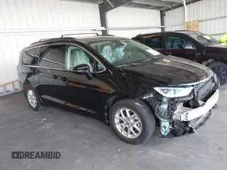 2022 Chrysler Pacifica Touring L with VIN 2C4RC1BG3NR142192, listed as a IAAI auction lot 42282806 with 92,877 mi miles and . Bid and sale history available at DreamBid. Image 1.