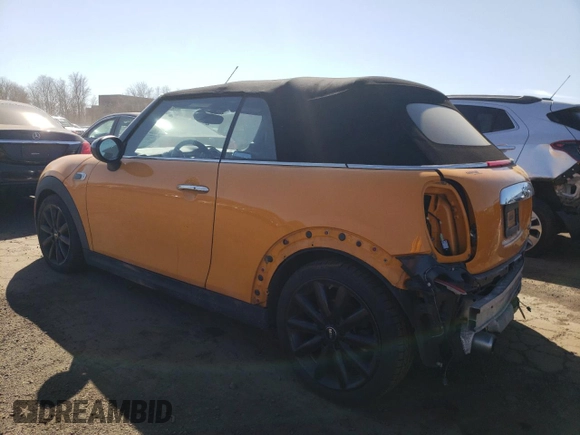 2017 MINI Convertible Cooper with VIN WMWWG5C31H3D00262, listed as a Copart auction lot 49154475 with 130,973 mi miles and Salvage title. Bid and sale history available at DreamBid. Image 2.