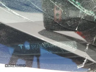 2023 Tesla Model 3 with VIN 5YJ3E1EA9PF558088, listed as a Copart auction lot 52228465 with 63,204 mi miles and Salvage title. Bid and sale history available at DreamBid. Image 12.
