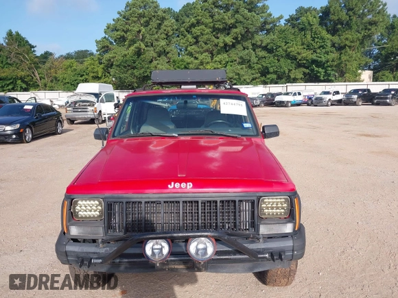 1996 Jeep Cherokee Sport with VIN 1J4FT68S4TL326973, listed as a IAAI auction lot 42744791 with 215,905 mi miles and . Bid and sale history available at DreamBid. Image 6.