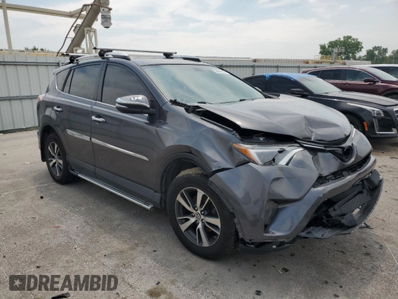 2016 Toyota RAV4 XLE with VIN 2T3RFREV0GW412875, listed as a Copart auction lot 59497545 with 226,604 mi miles and Salvage title. Bid and sale history available at DreamBid. Image 4.