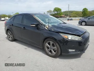 2017 Ford Focus SE with VIN 1FADP3FEXHL281886, listed as a Copart auction lot 53457455 with 84,228 mi miles and Salvage Title. Bid and sale history available at carsss.com. Image 4.