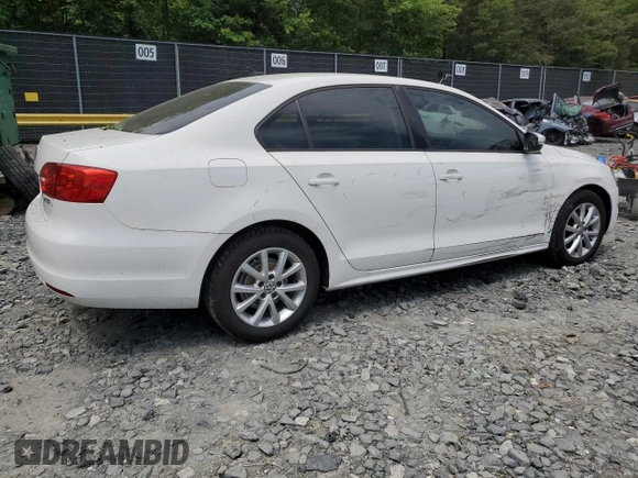 2012 Volkswagen Jetta SE z VIN 3VWDX7AJ7CM077878, wystawiony jako Copart lot #57782295 z przebiegiem 109 308 mil mil oraz Szkoda całkowita • Salvage title. Historia ofert i sprzedaży dostępna na DreamBid. Obrazek 3.