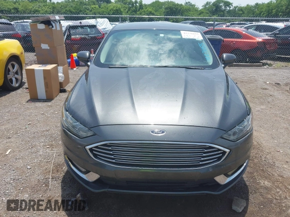 2017 Ford Fusion SE z VIN 3FA6P0HD3HR189144, wystawiony jako IAAI lot #42271155 z przebiegiem 172 146 mil mil oraz . Historia ofert i sprzedaży dostępna na DreamBid. Obrazek 12.