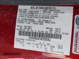 2010 Ford Fusion S with VIN 3FAHP0GA7AR228386, listed as a IAAI auction lot 41613583 with 99,281 mi miles. Bid and sale history available at carsss.com. Image 9.