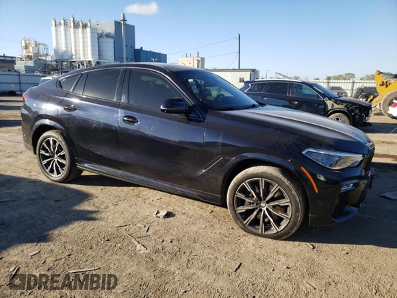 2020 BMW X6 xDrive40i z VIN 5UXCY6C03L9D00816, wystawiony jako Copart lot #76538674 z przebiegiem Nie podano mil oraz Szkoda całkowita • Salvage title. Historia ofert i sprzedaży dostępna na DreamBid. Obrazek 4.