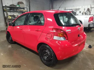2011 Toyota Yaris with VIN JTDKT4K31B5333148, listed as a Copart auction lot 45413015 with 97,450 mi miles and Salvage Title. Bid and sale history available at carsss.com. Image 2.