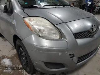 2009 Toyota Yaris with VIN JTDKT903695262863, listed as a IAAI auction lot 41456767 with 206,534 mi miles and . Bid and sale history available at DreamBid. Image 6.