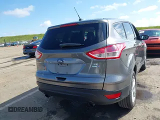 2014 Ford Escape SE with VIN 1FMCU9G96EUA06567, listed as a IAAI auction lot 41954345 with 88,294 mi miles and . Bid and sale history available at DreamBid. Image 16.