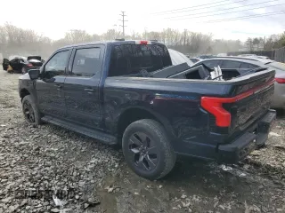 2023 Ford F-150 Lightning Pro z VIN 1FT6W1EV2PWG06829, wystawiony jako Copart lot #45875915 z przebiegiem 30 021 mil mil oraz Szkoda całkowita • Salvage title. Historia ofert i sprzedaży dostępna na DreamBid. Obrazek 2.