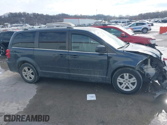 2013 Dodge Grand Caravan Crew with VIN 2C4RDGDG9DR740086, listed as a IAAI auction lot 41362852 with 145,881 mi miles and . Bid and sale history available at DreamBid. Image 12.