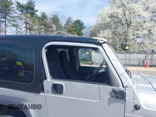 2006 Jeep Wrangler X with VIN 1J4FA39S16P787614, listed as a IAAI auction lot 41992315 with 61,788 mi miles. Bid and sale history available at carsss.com. Image 6.