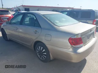 2006 Toyota Camry STD with VIN 4T1BE32KX6U148521, listed as a IAAI auction lot 42014266 with 148,694 mi miles. Bid and sale history available at carsss.com. Image 3.