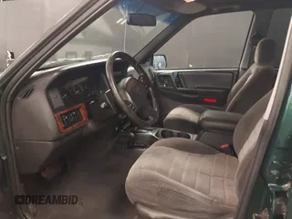 1998 Jeep Grand Cherokee Laredo с VIN 1J4GZ58S8WC143478, выставлен на аукционе IAAI как лот 42468429 с пробегом 159 855 миль миль и . История ставок и продаж доступна на DreamBid. Изображение 5.