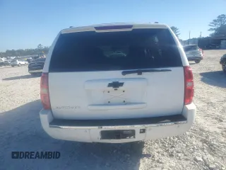 2014 Chevrolet Suburban LTZ with VIN 1GNSCKE02ER105377, listed as a Copart auction lot 76697154 with 229,461 mi miles and Salvage title. Bid and sale history available at DreamBid. Image 9.
