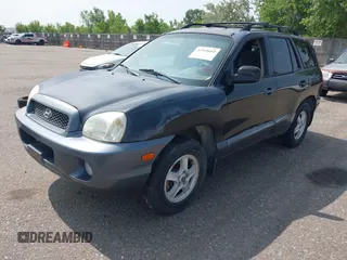 2003 Hyundai Santa Fe GLS z VIN KM8SC13D73U347225, wystawiony jako IAAI lot #42368665 z przebiegiem 208 072 mil mil oraz . Historia ofert i sprzedaży dostępna na DreamBid. Obrazek 2.