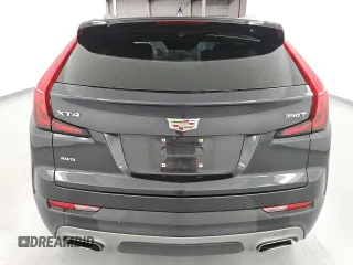 2023 Cadillac XT4 AWD Premium Luxury z VIN 1GYFZDR42PF174473, wystawiony jako Copart lot #55953305 z przebiegiem 42 268 mil mil oraz Szkoda całkowita • Salvage title. Historia ofert i sprzedaży dostępna na DreamBid. Obrazek 6.