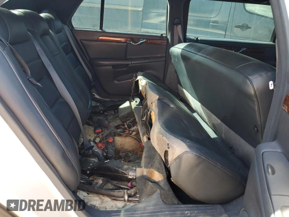 2002 Cadillac DeVille Limousine z VIN 1GEEH90Y72U550842, wystawiony jako Copart lot #52629735 z przebiegiem Nie podano mil oraz Szkoda całkowita • Salvage title. Historia ofert i sprzedaży dostępna na DreamBid. Obrazek 11.