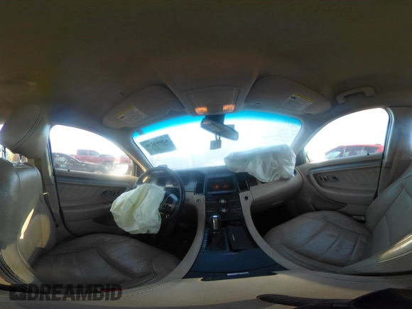 2014 Ford Taurus SEL with VIN 1FAHP2E80EG159131, listed as a IAAI auction lot 42004296 with 140,213 mi miles and . Bid and sale history available at DreamBid. Image 19.