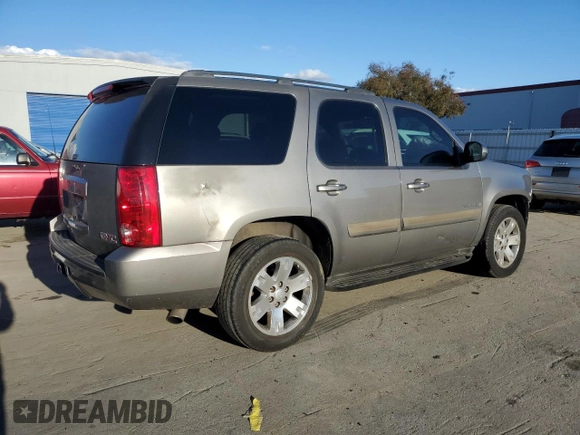 2007 GMC Yukon SLE w/3SA with VIN 1GKFC13C97J311870, listed as a Copart auction lot 44652555 with 142,104 mi miles and Salvage Title. Bid and sale history available at carsss.com. Image 3.