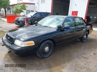 2005 Ford Police Interceptor z VIN 2FAHP71WX5X154384, wystawiony jako IAAI lot #40735796 z przebiegiem 84 143 mil mil oraz . Historia ofert i sprzedaży dostępna na DreamBid. Obrazek 17.