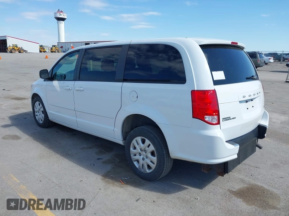 2014 Dodge Grand Caravan American Value with VIN 2C4RDGBG8ER140342, listed as a IAAI auction lot 42198306 with 135,564 mi miles and . Bid and sale history available at DreamBid. Image 3.