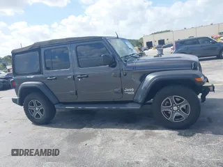 2018 Jeep Wrangler Unlimited Sport S z VIN 1C4HJXDGXJW165312, wystawiony jako IAAI lot #42095590 z przebiegiem 90 598 mil mil oraz . Historia ofert i sprzedaży dostępna na DreamBid. Obrazek 13.