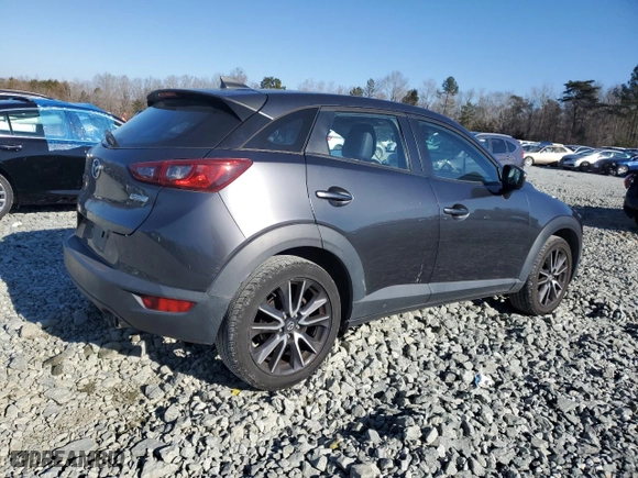 2018 Mazda CX-3 Touring with VIN JM1DKFC7XJ0332519, listed as a Copart auction lot 87897575 with 66,520 mi miles and Salvage Title. Bid and sale history available at carsss.com. Image 3.