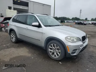 2012 BMW X5 35i with VIN 5UXZV4C57CL747717, listed as a Copart auction lot 63003135 with 135,999 mi miles and Clean title. Bid and sale history available at DreamBid. Image 4.