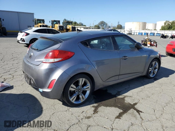 2012 Hyundai Veloster w/Gray Int z VIN KMHTC6AD9CU079542, wystawiony jako Copart lot #55998045 z przebiegiem 98 065 mil mil oraz Szkoda całkowita • Salvage title. Historia ofert i sprzedaży dostępna na DreamBid. Obrazek 3.