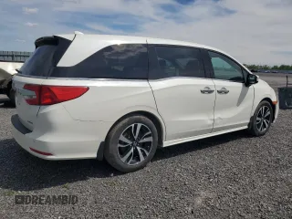 2019 Honda Odyssey Touring z VIN 5FNRL6H80KB501681, wystawiony jako Copart lot #58814945 z przebiegiem 105 287 mil mil oraz Szkoda całkowita • Salvage title. Historia ofert i sprzedaży dostępna na DreamBid. Obrazek 3.