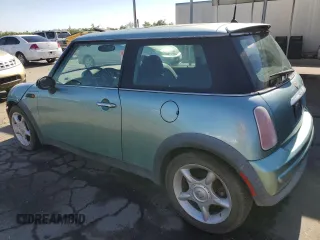 2002 MINI Hardtop with VIN WMWRC33422TE13196, listed as a Copart auction lot 59277643 with 80,501 mi miles and Non Repairable. Bid and sale history available at DreamBid. Image 2.