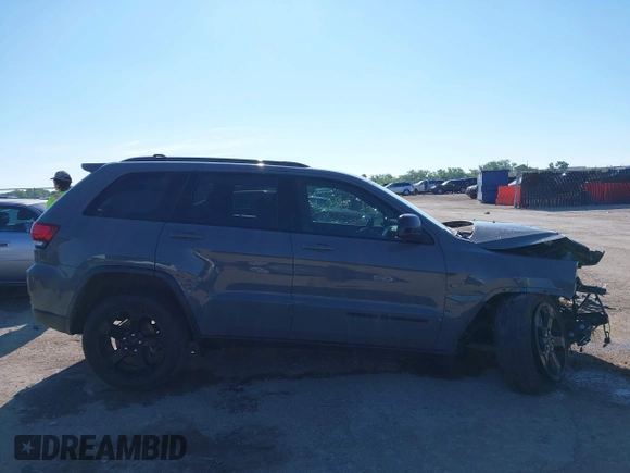 2019 Jeep Grand Cherokee Laredo E with VIN 1C4RJFAG2KC611457, listed as a IAAI auction lot 42212982 with 97,603 mi miles and . Bid and sale history available at DreamBid. Image 13.
