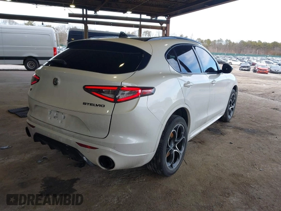 2021 Alfa Romeo Stelvio Ti z VIN ZASPAKBN3M7D13693, wystawiony jako IAAI lot #41584848 z przebiegiem 46 016 mil mil oraz . Historia ofert i sprzedaży dostępna na DreamBid. Obrazek 4.