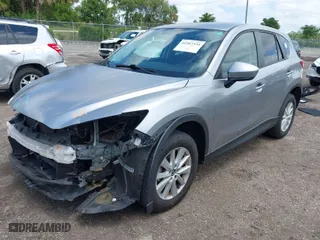 2014 Mazda CX-5 Touring with VIN JM3KE2CY4E0357445, listed as a IAAI auction lot 41967334 with 115,535 mi miles. Bid and sale history available at carsss.com. Image 2.