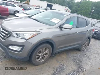 2016 Hyundai Santa Fe z VIN 5XYZU3LB1GG358111, wystawiony jako IAAI lot #42377494 z przebiegiem 92 745 mil mil oraz . Historia ofert i sprzedaży dostępna na DreamBid. Obrazek 14.