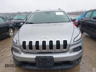 2016 Jeep Cherokee Latitude with VIN 1C4PJLCB7GW273440, listed as a IAAI auction lot 41452456 with 106,048 mi miles. Bid and sale history available at carsss.com. Image 12.