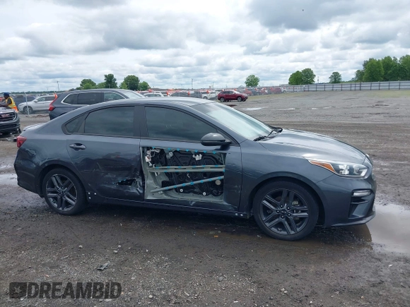 2021 Kia Forte GT-Line z VIN 3KPF34AD9ME293470, wystawiony jako IAAI lot #42335104 z przebiegiem 75 132 mil mil oraz . Historia ofert i sprzedaży dostępna na DreamBid. Obrazek 14.