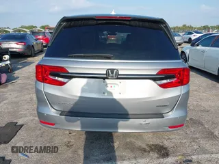 2023 Honda Odyssey Touring with VIN 5FNRL6H86PB020700, listed as a IAAI auction lot 41961098 with 66,512 mi miles and . Bid and sale history available at DreamBid. Image 16.
