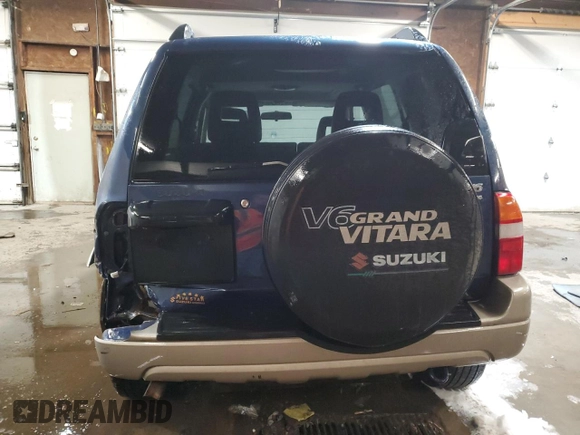 2002 Suzuki Grand Vitara JLX z VIN JS3TD62V524160739, wystawiony jako Copart lot #88416995 z przebiegiem 98 820 mil mil oraz Szkoda całkowita • Salvage title. Historia ofert i sprzedaży dostępna na DreamBid. Obrazek 6.