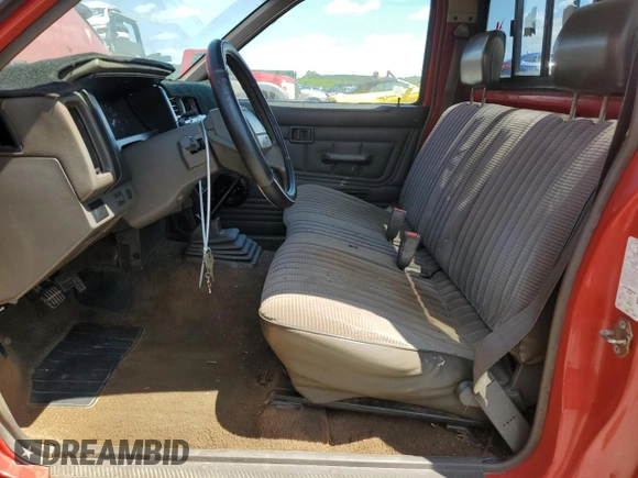 1992 Nissan Frontier z VIN 1N6SD11S0NC356308, wystawiony jako Copart lot #55831745 z przebiegiem 327 113 mil mil oraz Szkoda całkowita • Salvage title. Historia ofert i sprzedaży dostępna na DreamBid. Obrazek 7.