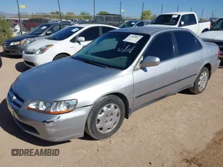 1999 Honda Accord LX z VIN JHMCG5648XC803856, wystawiony jako IAAI lot #42063037 z przebiegiem 254 421 mil mil oraz . Historia ofert i sprzedaży dostępna na DreamBid. Obrazek 2.