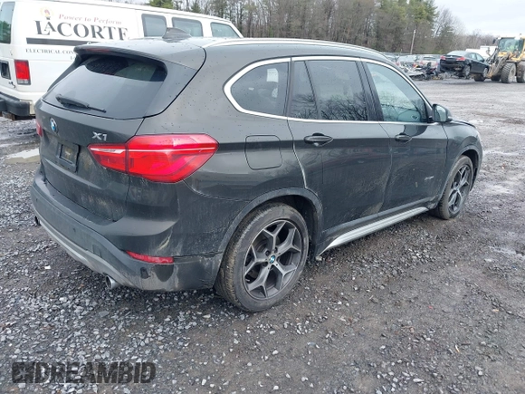 2018 BMW X1 xDrive28i with VIN WBXHT3C34J5K31430, listed as a IAAI auction lot 41954792 with 125,447 mi miles. Bid and sale history available at carsss.com. Image 4.