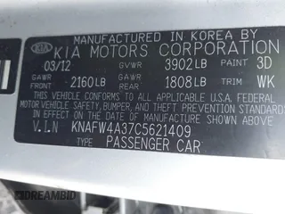 2012 Kia Forte SX with VIN KNAFW4A37C5621409, listed as a IAAI auction lot 41608698 with 202,731 mi miles. Bid and sale history available at carsss.com. Image 9.